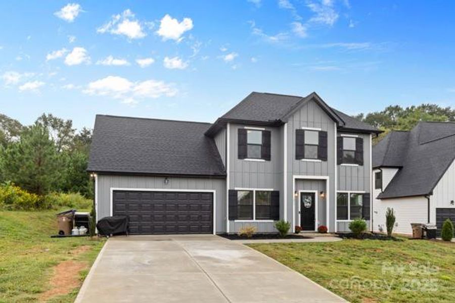 Front exterior of a new home in , Shelby, NC, highlighting curb appeal (Image 21).