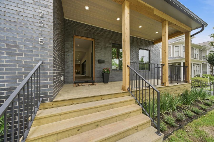 Inviting front porch, perfect space for morning coffee or evening cocktails.