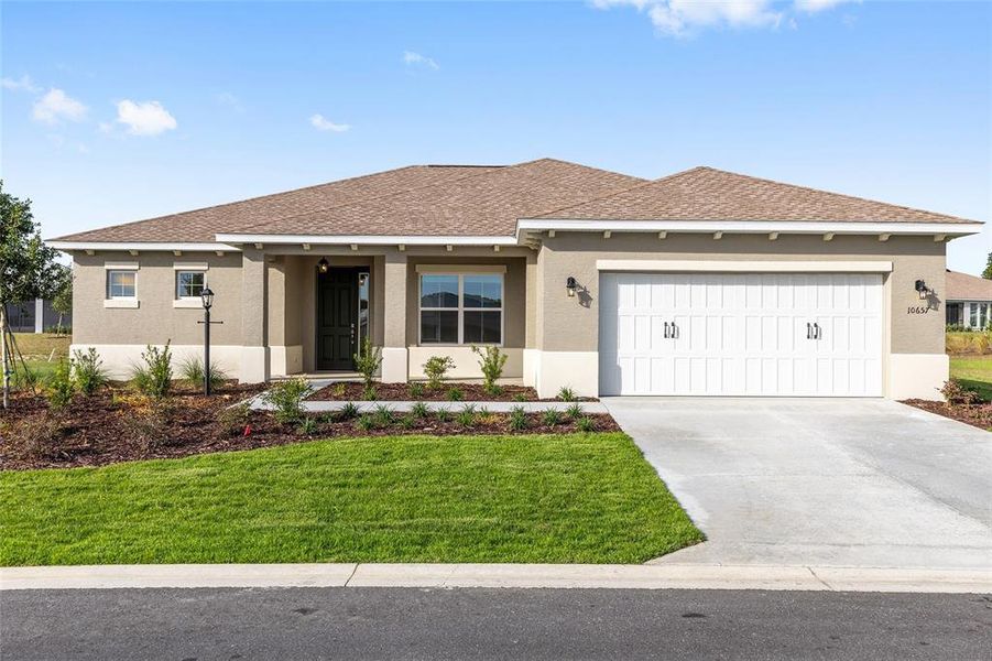 Front exterior of a new home in , Ocala, FL, highlighting curb appeal (Image 18).