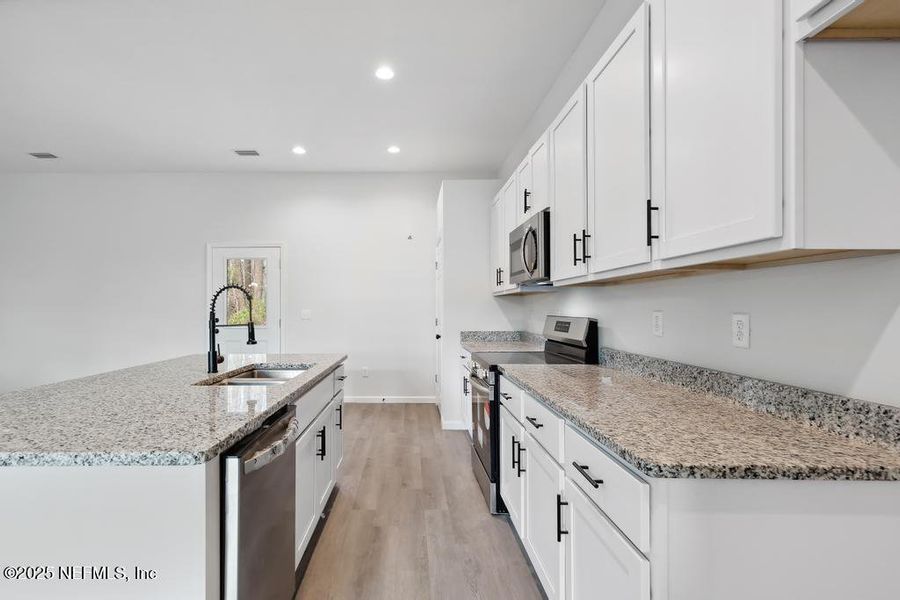 Furnished interior view inside a new home in , Jacksonville (Image 7).