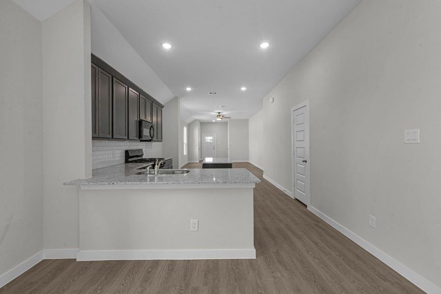 Furnished interior view inside a new home in Lexington Heights, Willis (Image 10).