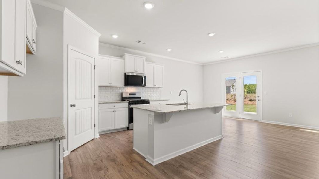 Furnished interior view inside a new home in Parkside at Carter Grove, Cartersville (Image 2).