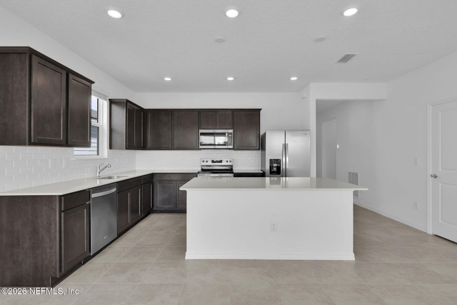 Furnished interior view inside a new home in Hyland Trail, Green Cove Springs (Image 12).