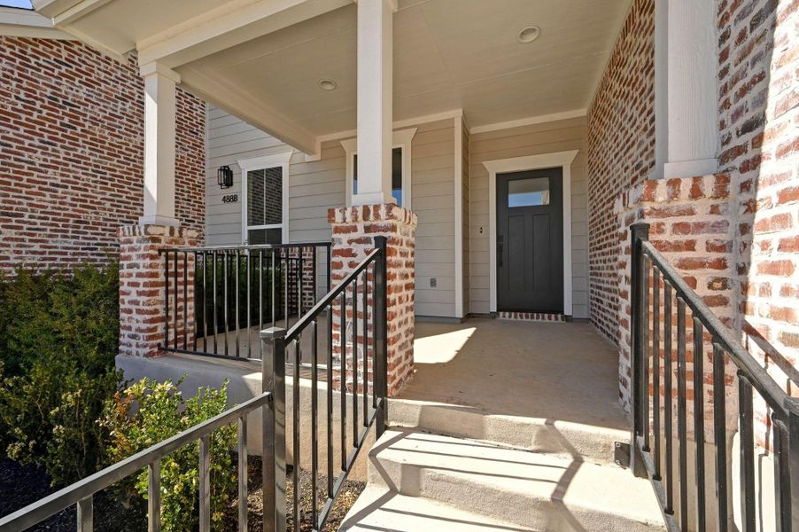 Exterior details and patio area of a home in The Porch at Du Pre, Buda (Image 3).