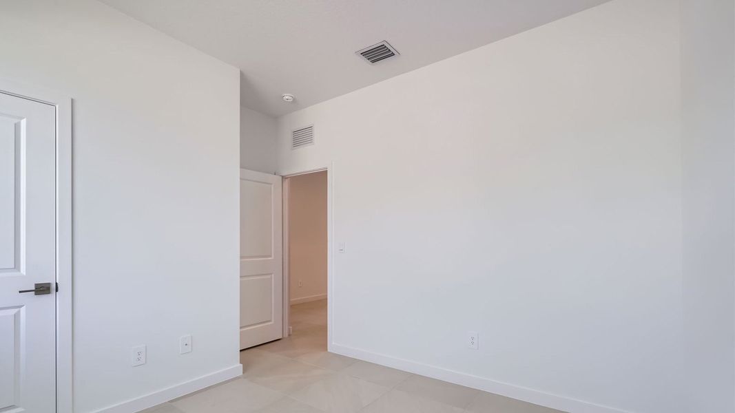 Representative unfurnished interior of a home built from the Cali by D.R. Horton in Twin Oaks, Stuart (Image 18).