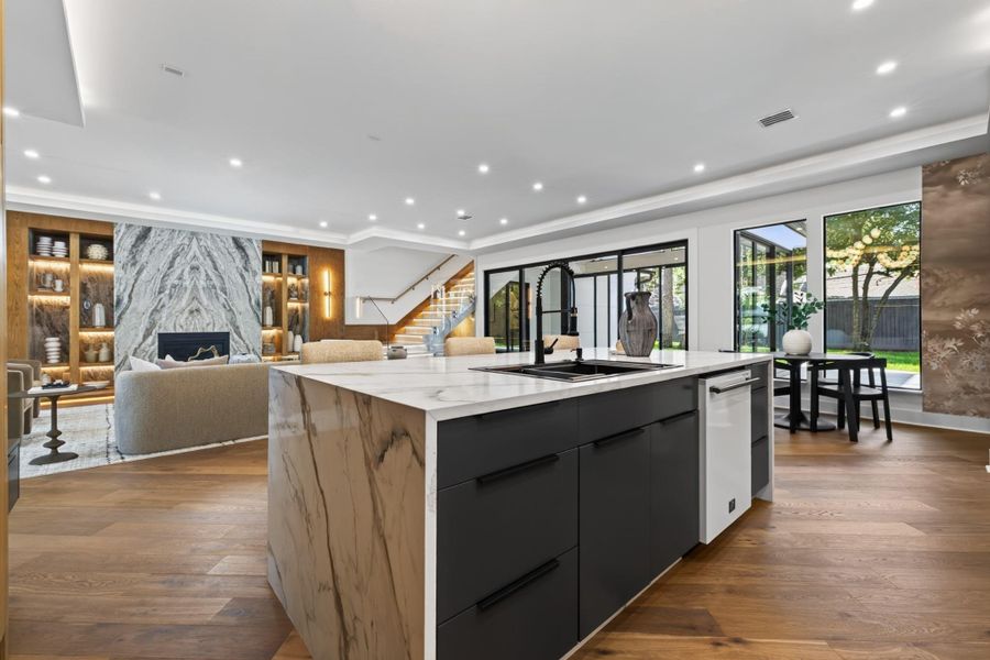 Additional kitchen perspective highlights the thoughtful layout and connection to the surrounding living spaces.