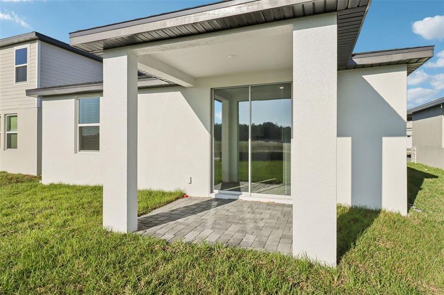 Exterior details and patio area of a home in The Reserve at Hammock Oaks - Classic Series, Lady Lake (Image 20). Exterior details and patio area of a home in The Reserve at Hammock Oaks - Classic Series, Lady Lake (Image 20).