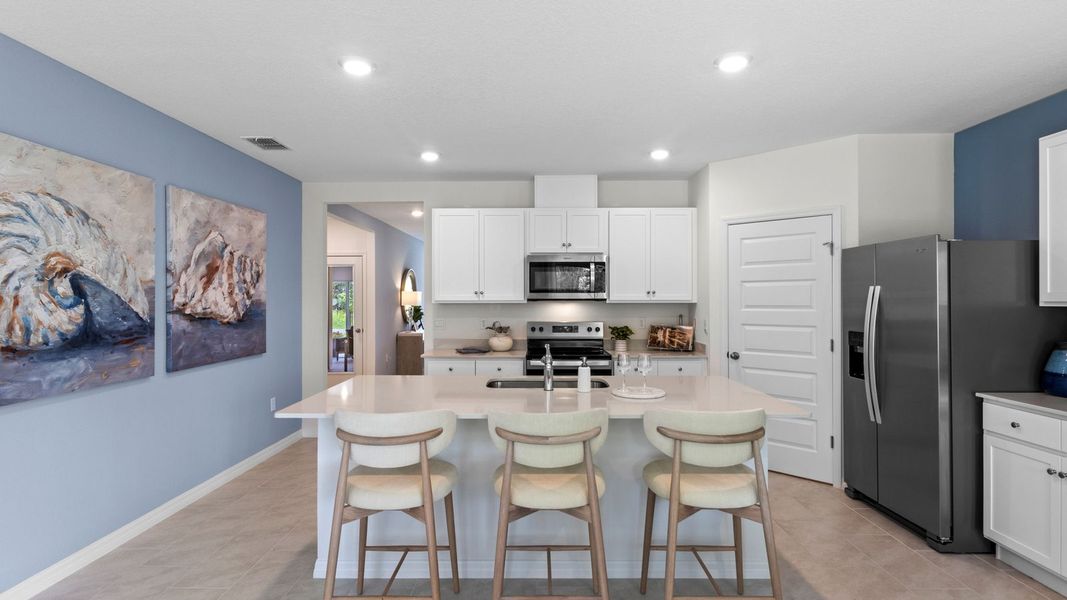 Furnished interior view inside a new home in Sun N Lake, Sebring (Image 13).