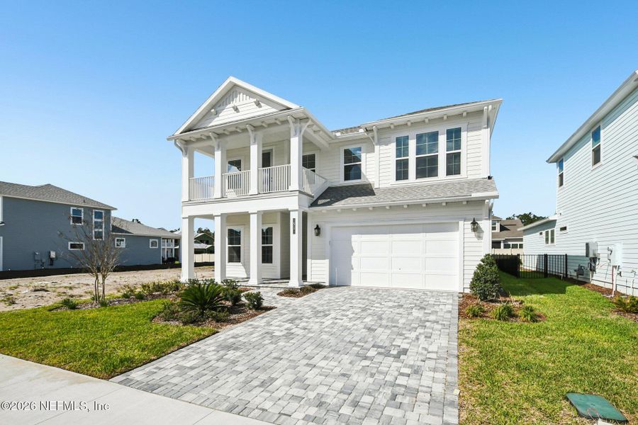 Front exterior of a new home in Nocatee, Ponte Vedra, FL, highlighting curb appeal (Image 29).