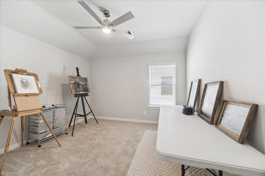 Spacious room with natural light, neutral carpet, and white walls. Spacious room with natural light, neutral carpet, and white walls.