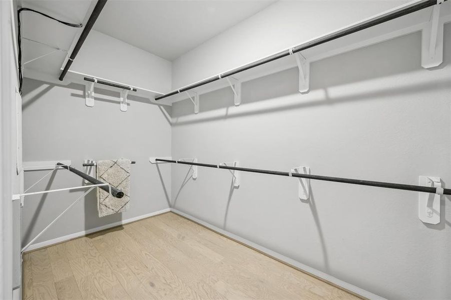 Large walk-in closet in owner's suite (*Photo not of actual home and used for illustration purposes only.)