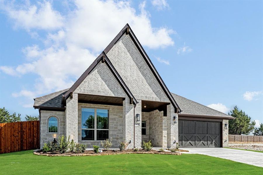 Front exterior of a new home in Mockingbird Heights Classic 60, Midlothian, TX, highlighting curb appeal (Image 2). Front exterior of a new home in Mockingbird Heights Classic 60, Midlothian, TX, highlighting curb appeal (Image 2).