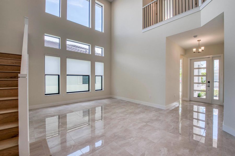 Furnished interior view inside a new home in Apex at Avenir, Palm Beach Gardens (Image 34).