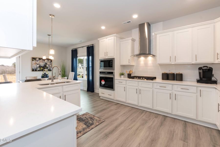 Furnished interior view inside a new home in Hidden Pines, Cameron (Image 4).