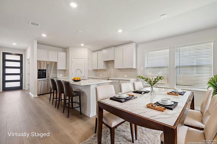 Furnished interior view inside a new home in Estancia Ranch - Premier Series, San Antonio (Image 5).