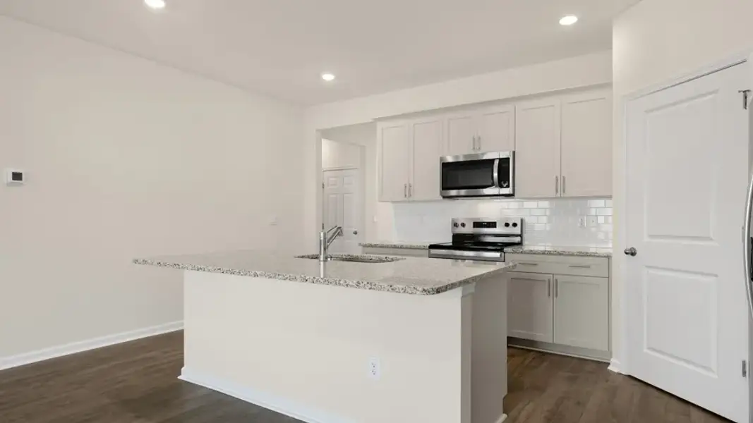 Furnished interior view inside a new home in Baker Farm, Youngsville (Image 7).