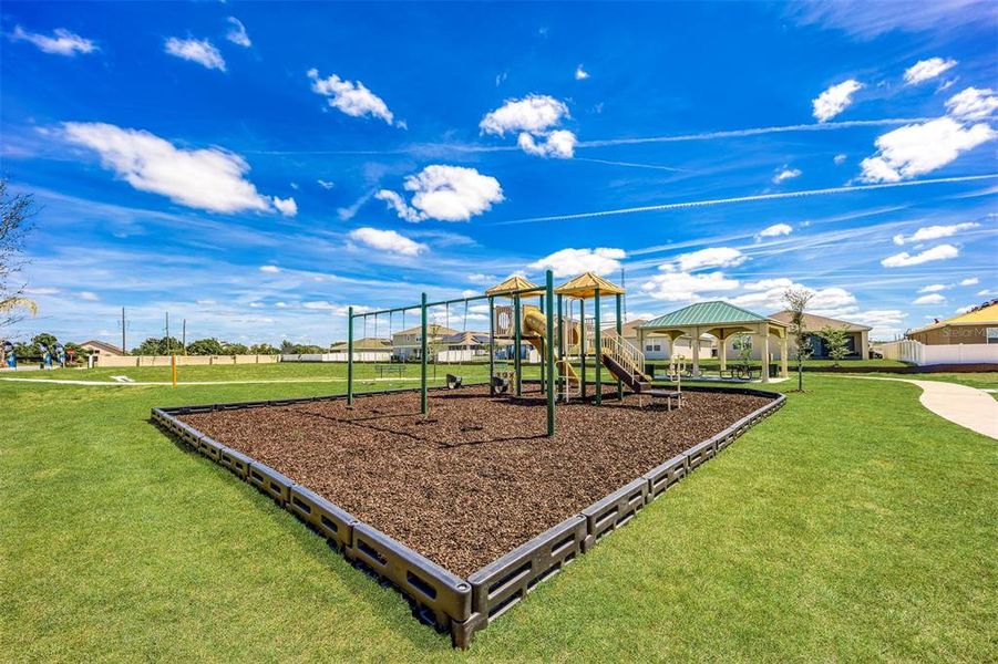 Front exterior of a new home in Sol Vista, Dundee, FL, highlighting curb appeal (Image 13).