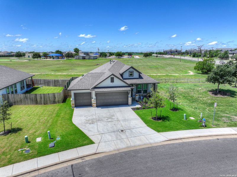 Front exterior of a new home in August Fields, New Braunfels, TX, highlighting curb appeal (Image 20).