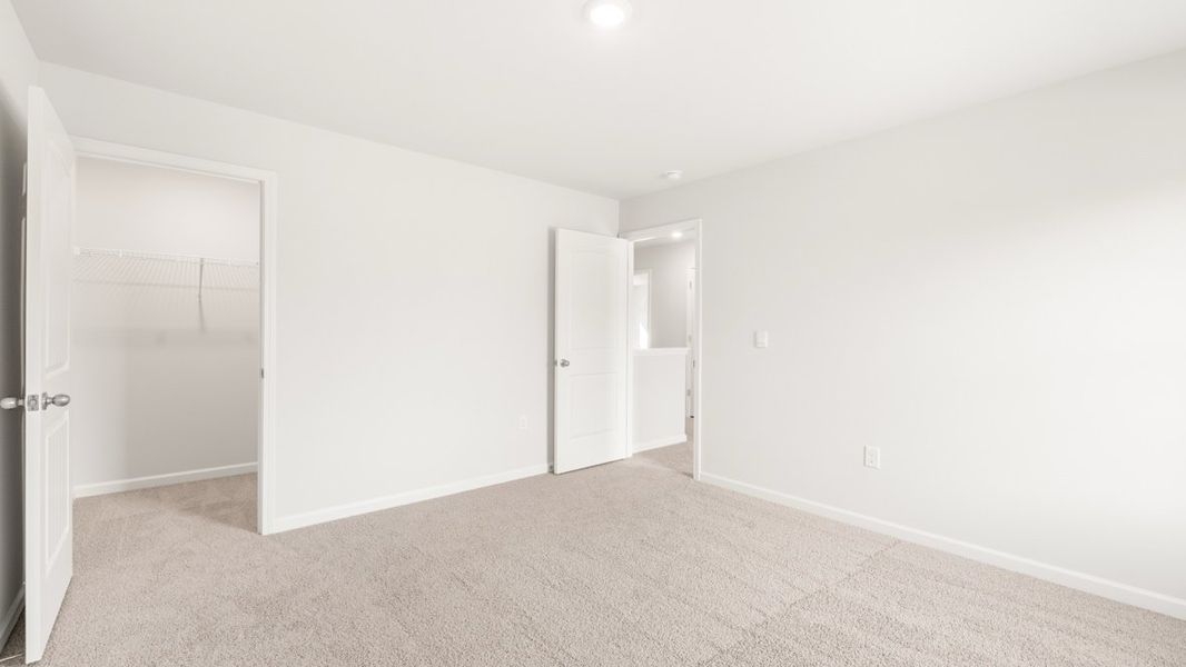 Representative unfurnished interior of a home built from the Penwell by D.R. Horton in Oakleigh Glen, Dallas (Image 28).