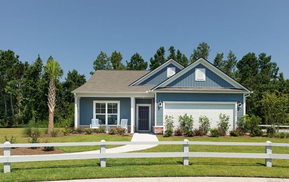 Front exterior of a new home in Crescent Cove, Myrtle Beach, SC, highlighting curb appeal (Image 2). Front exterior of a new home in Crescent Cove, Myrtle Beach, SC, highlighting curb appeal (Image 2).