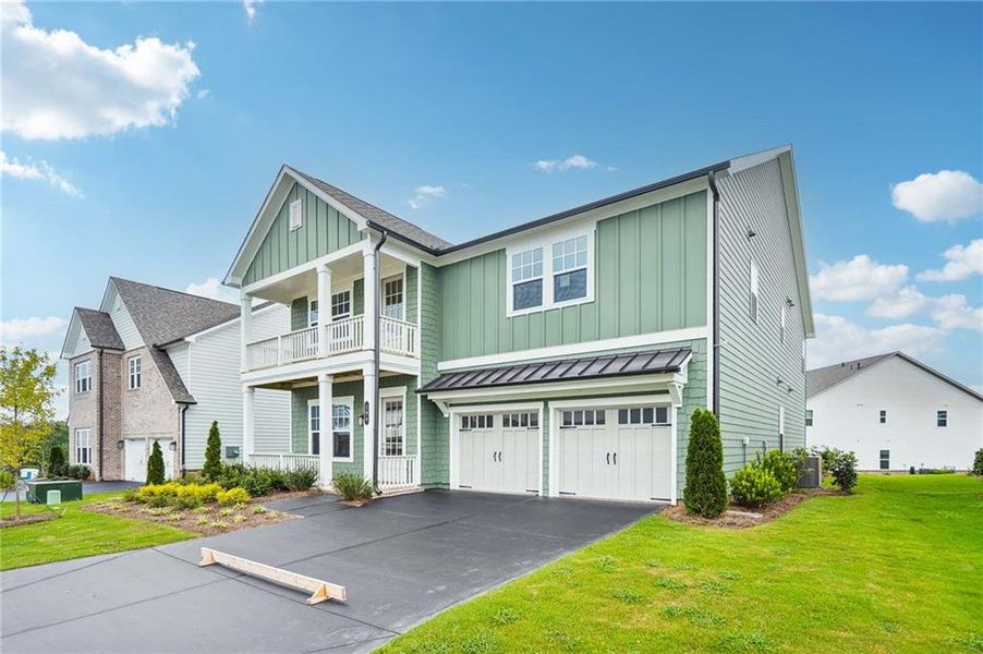 Front exterior of a new home in East Harbor II at Chestatee, Dawsonville, GA, highlighting curb appeal (Image 2).