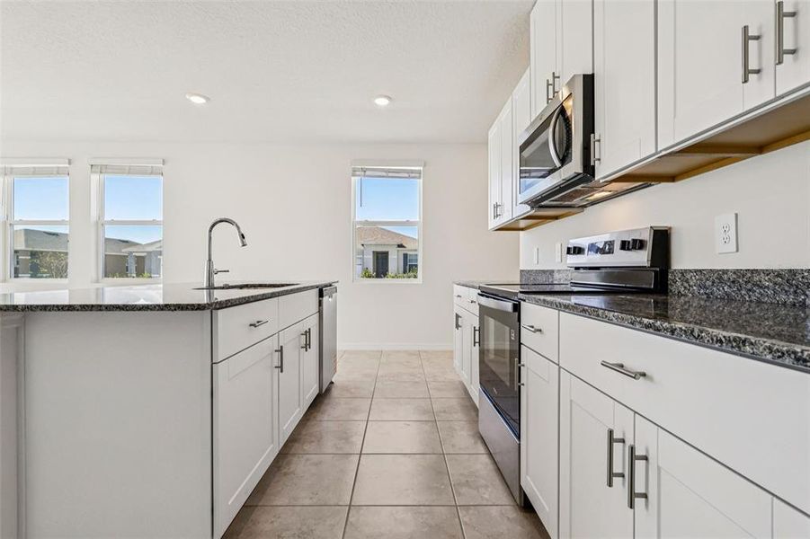Furnished interior view inside a new home in Lake Deer Estates - Classic Series, Poinciana (Image 10).