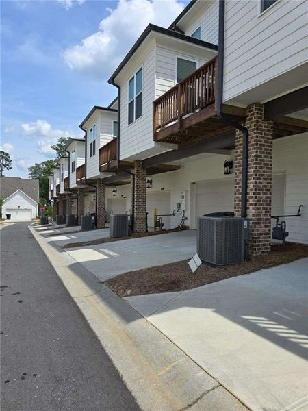 Front exterior of a new home in , Suwanee, GA, highlighting curb appeal (Image 27).