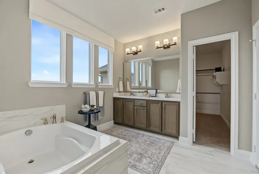 Furnished interior view inside a new home in Leonard Trails, Anna (Image 27).