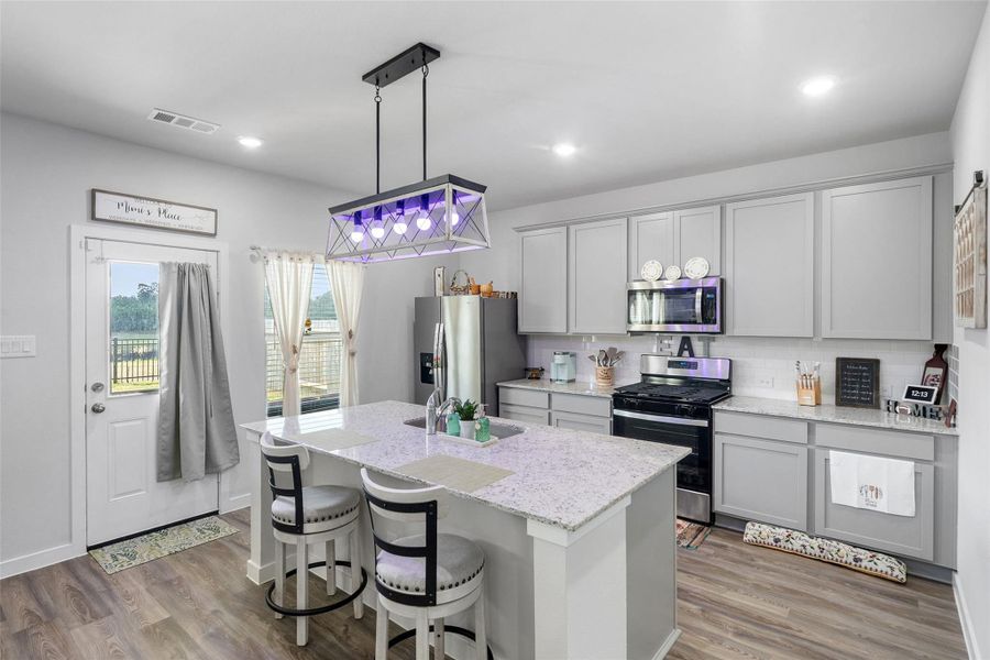 Furnished interior view inside a new home in Lakes at Black Oak, Magnolia (Image 8). Furnished interior view inside a new home in Lakes at Black Oak, Magnolia (Image 8).