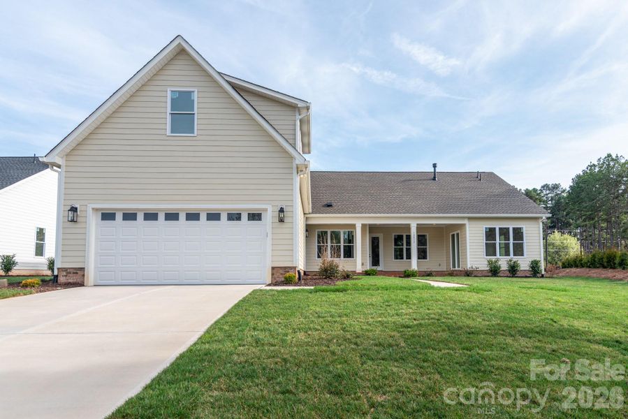 Front exterior of a new home in Bailey's Glen, Huntersville, NC, highlighting curb appeal (Image 20).