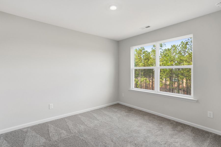Spacious, unfurnished interior of a new home in Sweetbrier, Durham (Image 30).