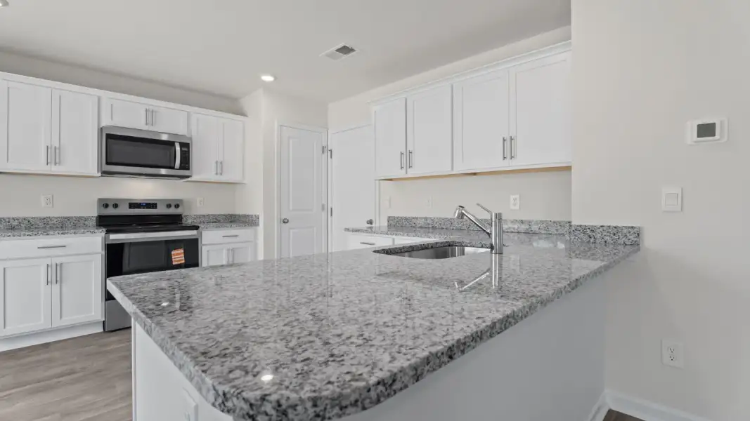 Furnished interior view inside a new home in Jetstream Park, Wilson (Image 7).