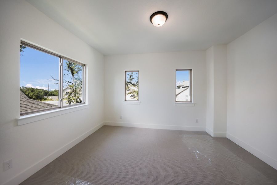Representative unfurnished interior of a home built from the The Travis by Whitestone Custom Homes in Johnson Ranch, Bulverde (Image 56).