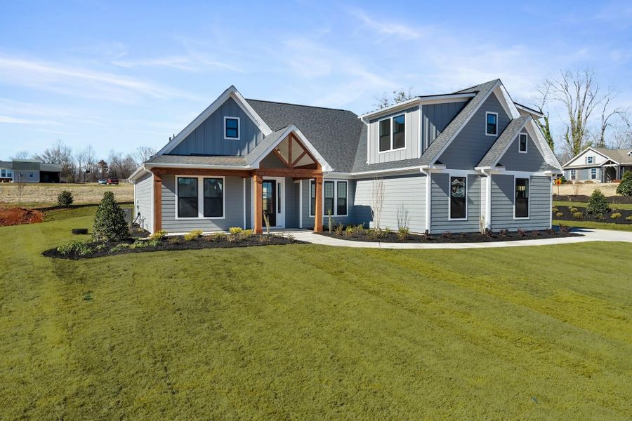 Front exterior of a new home in Horry County Homes, Conway, SC, highlighting curb appeal (Image 2). Front exterior of a new home in Horry County Homes, Conway, SC, highlighting curb appeal (Image 2).