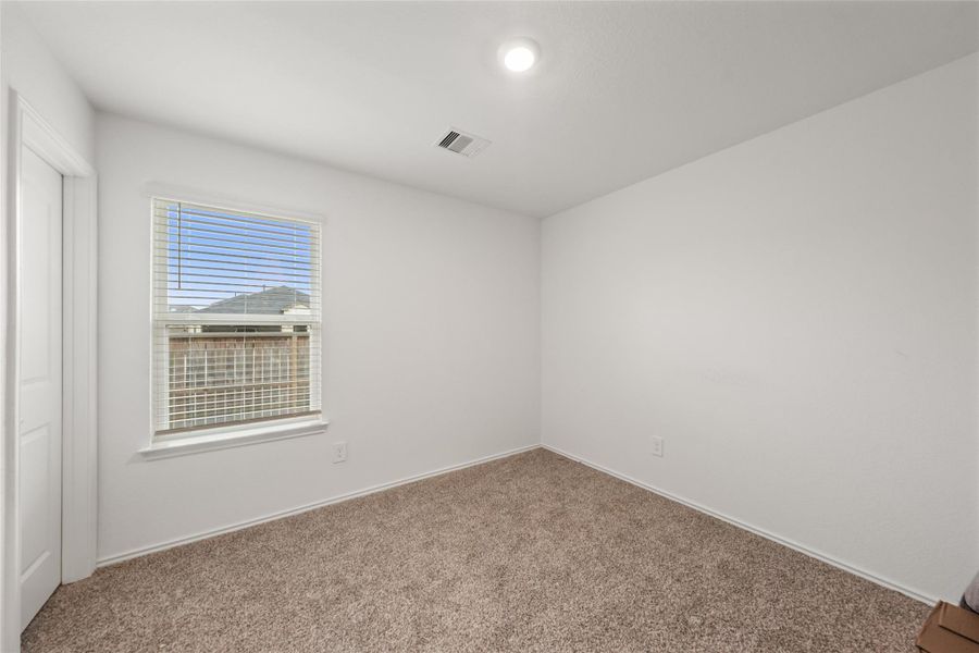 Spacious, unfurnished interior of a new home in The Canopies, Splendora (Image 17).
