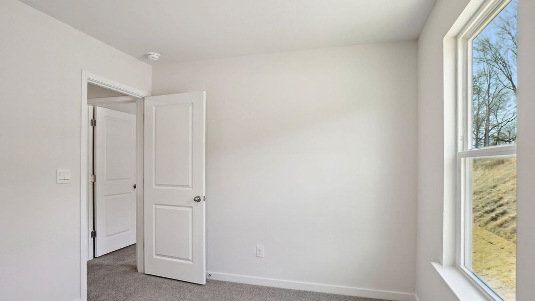 Spacious, unfurnished interior of a new home in Tap Root Farms, Fletcher (Image 22).