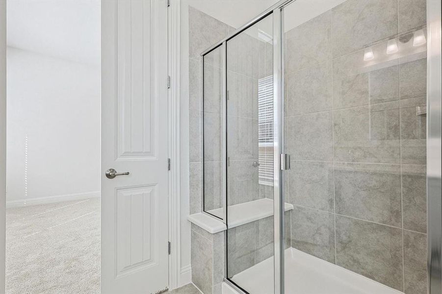 Bathroom featuring an enclosed shower