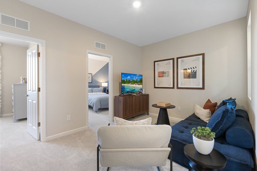 Representative furnished interior of a home built from the 4901 by Risewell Homes in The Aurora Highlands, Aurora (Image 18).