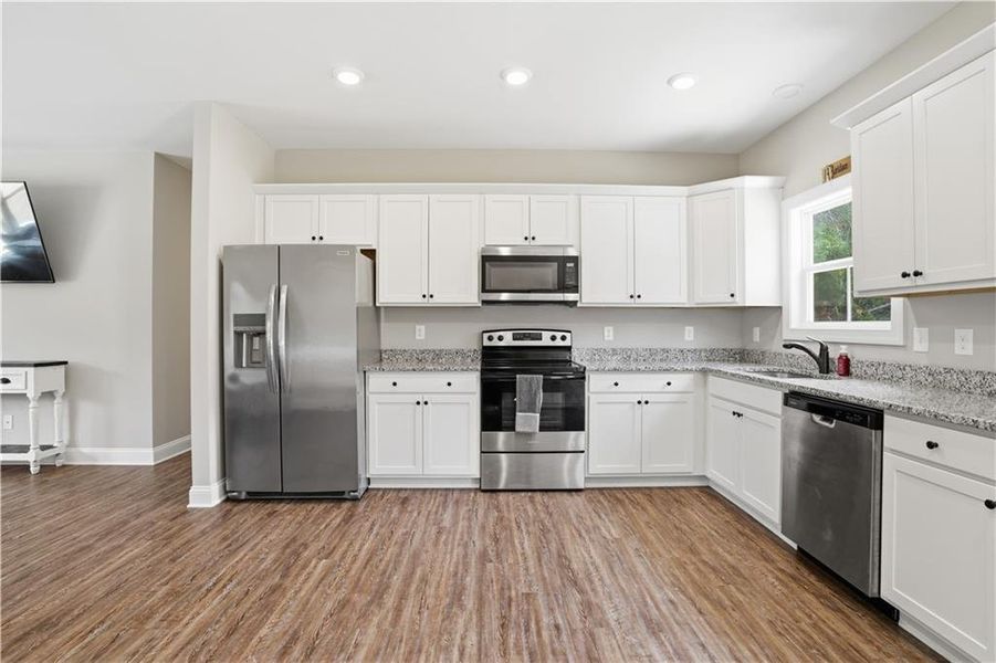 Furnished interior view inside a new home in , Kingston (Image 7).