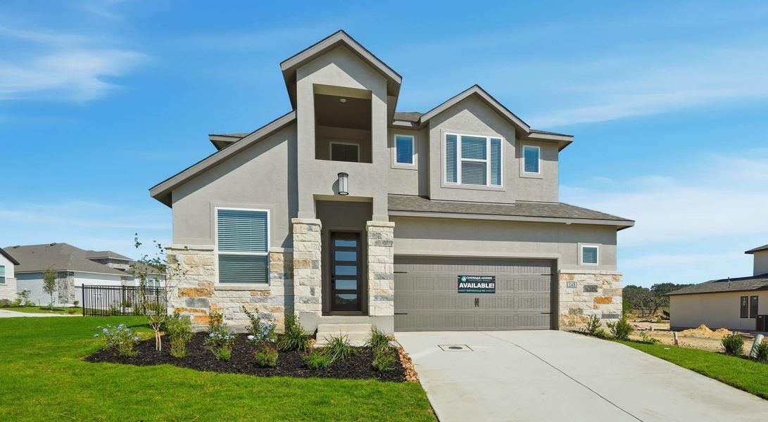 Front exterior of a new home in Esperanza – New Phase Now Selling, Boerne, TX, highlighting curb appeal (Image 27).