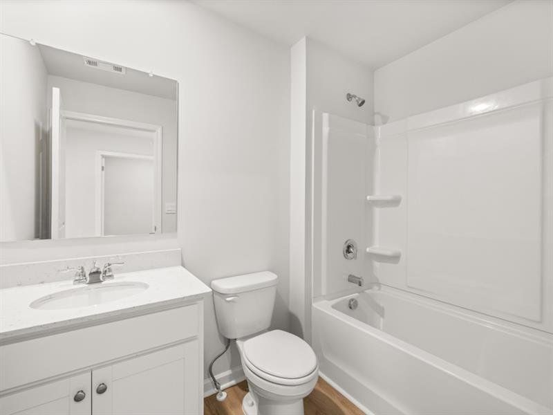 Furnished interior view inside a new home in Waypoint, Flowery Branch (Image 7).