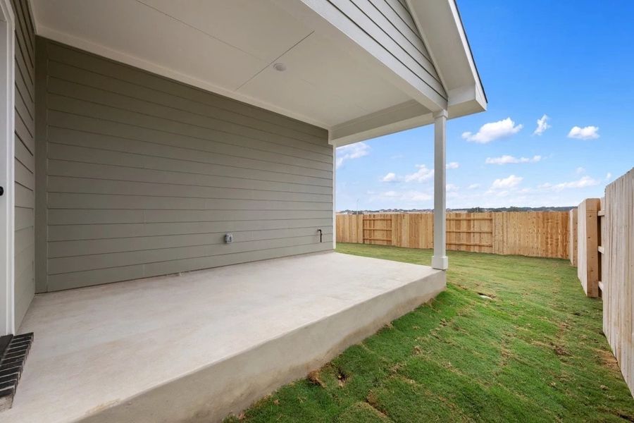 Exterior details and patio area of a home in Lariat, Liberty Hill (Image 4).