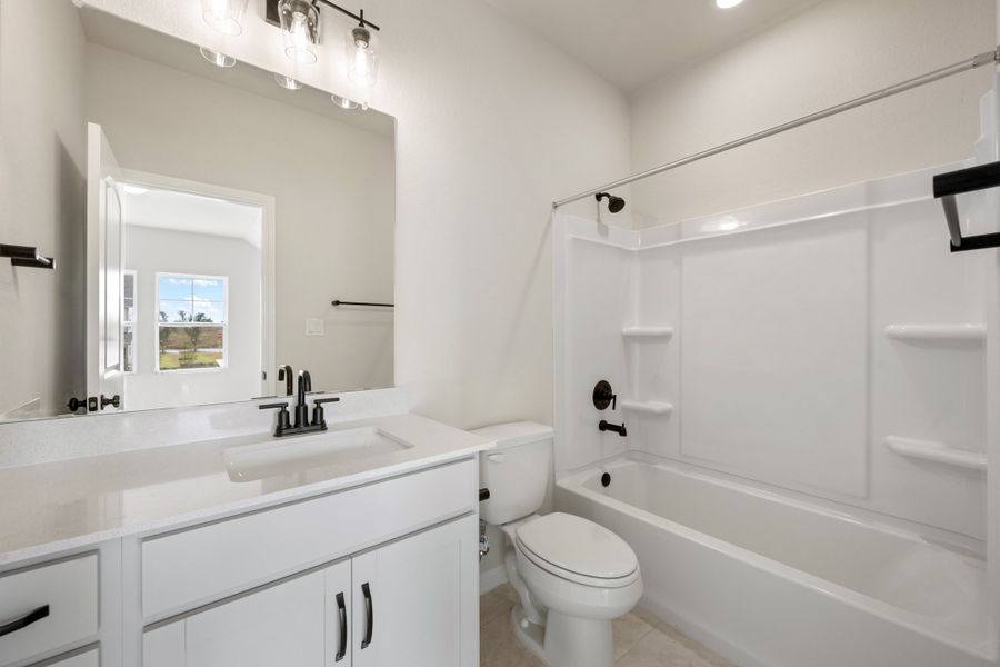 Representative furnished interior of a home built from the Granbury by Ashton Woods in The Trails at Carmel, Pflugerville (Image 39).