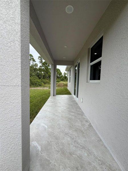 Exterior details and patio area of a home in , Lehigh Acres (Image 23). Exterior details and patio area of a home in , Lehigh Acres (Image 23).