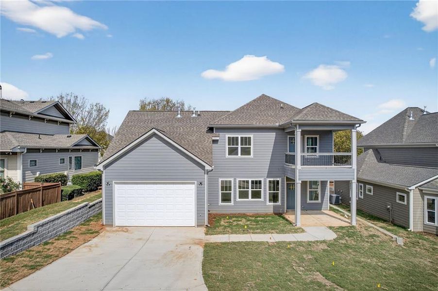 Front exterior of a new home in , Douglasville, GA, highlighting curb appeal (Image 24).