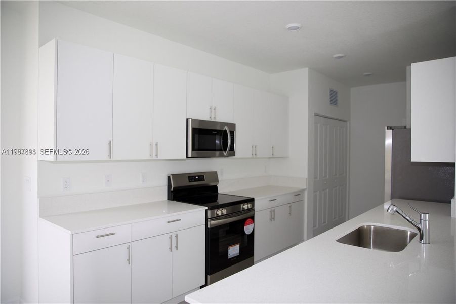 Furnished interior view inside a new home in , Dania Beach (Image 15). Furnished interior view inside a new home in , Dania Beach (Image 15).