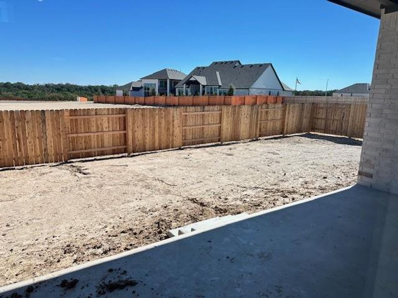 Rear Covered Patio and backyard