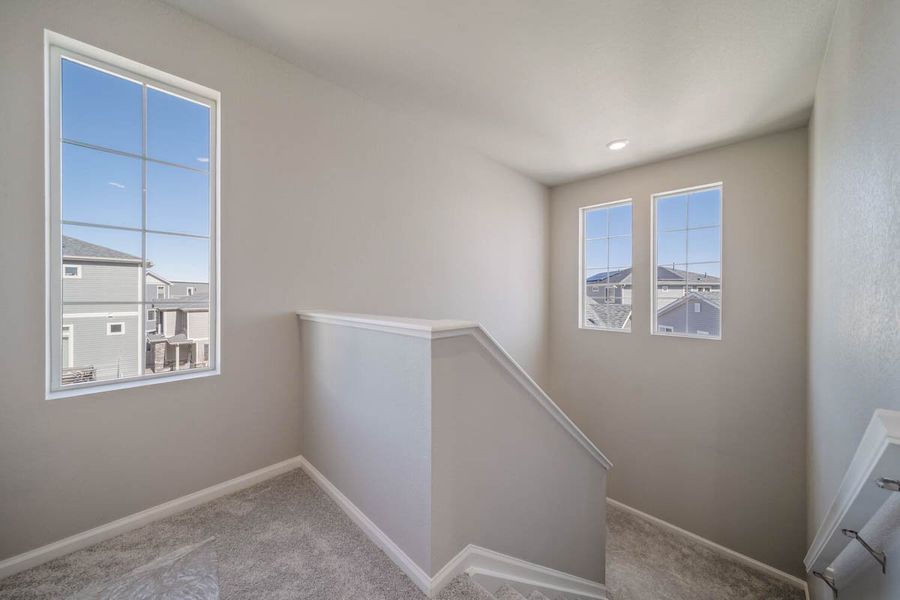 Spacious, unfurnished interior of a new home in Thompson River Ranch, Johnstown (Image 20).