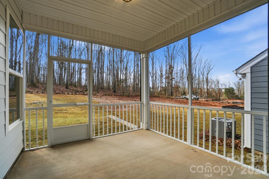 Exterior details and patio area of a home in Villas at Prestwick, Mooresville (Image 26).