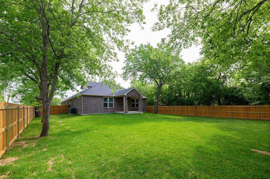 Exterior details and patio area of a home in , Garland (Image 3).